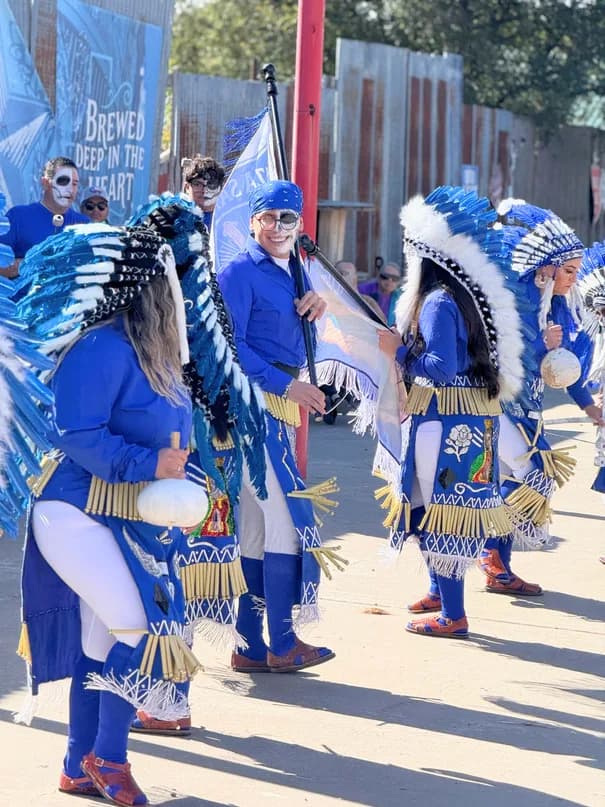 Folklórico dancers in feathered headdresses